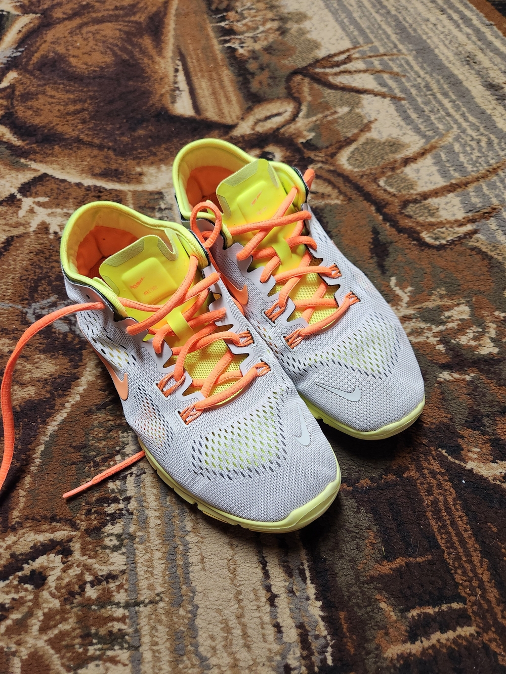 Nike White Mesh Sneakers with Neon Yellow and Orange Accents